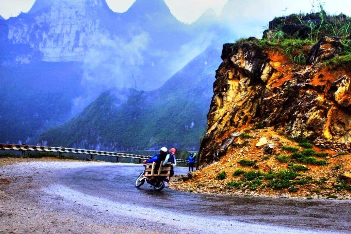 Traveler riding a motorbike along the Ha Giang Loop