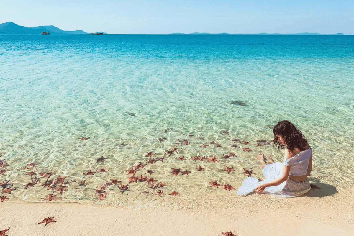 Crystal-clear waters and starfish at Starfish Beach, Phu Quoc