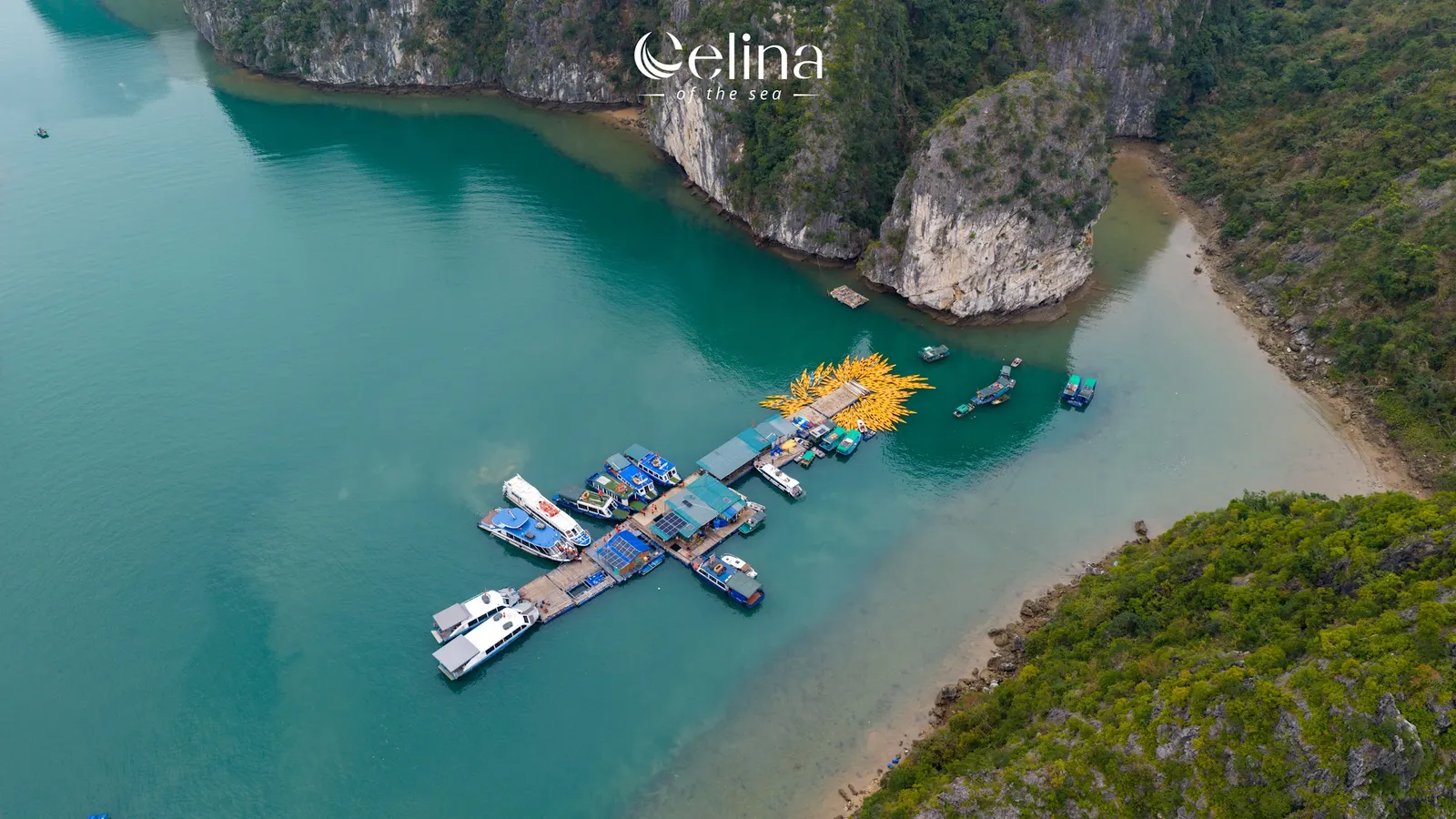 Kayak station below the cliffs of Lan Ha Bay from the air