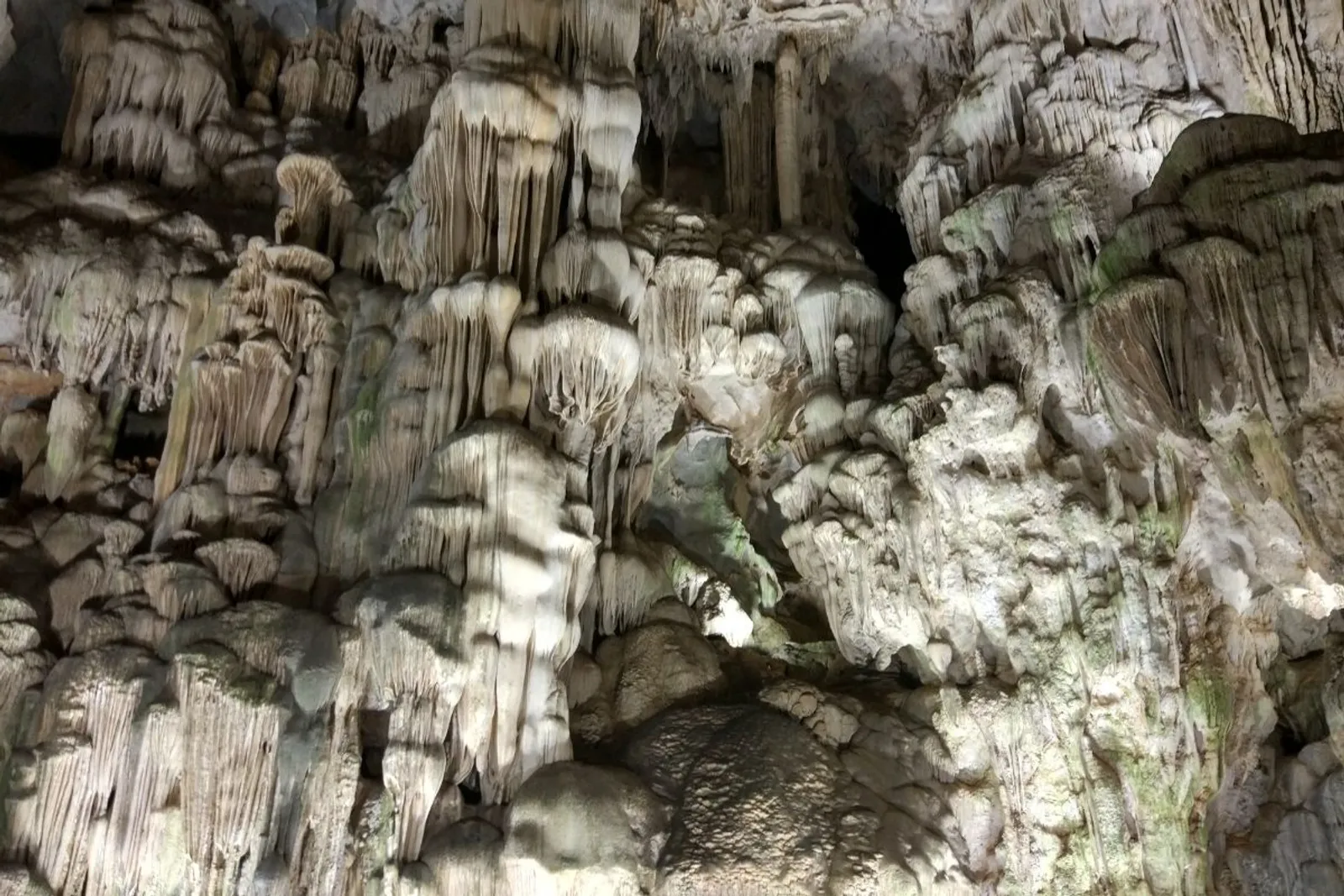 Stalactites inside a limestone cave in Halong Bay